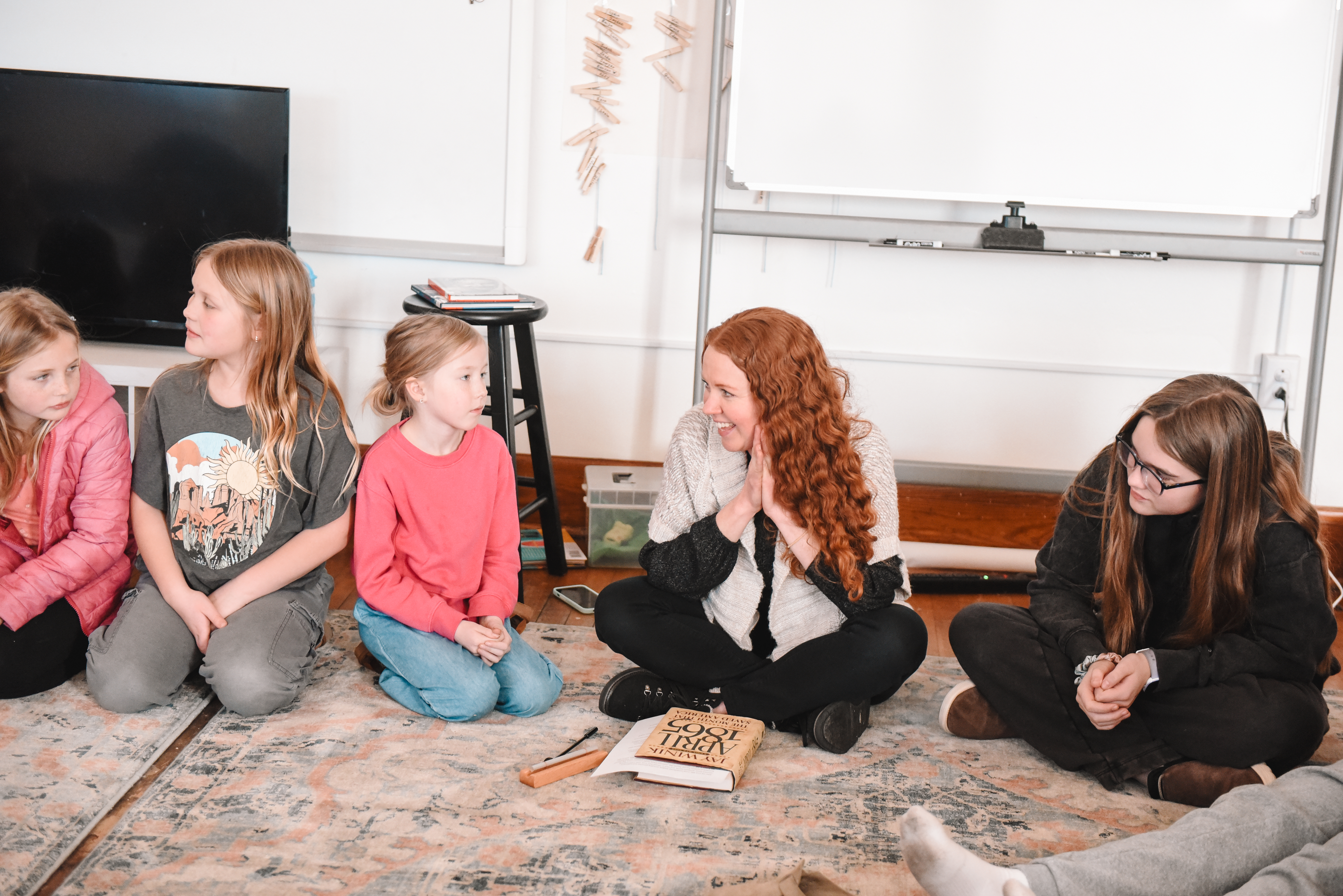 Learners in a Socratic discussion with their Guide